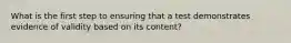 What is the first step to ensuring that a test demonstrates evidence of validity based on its content?