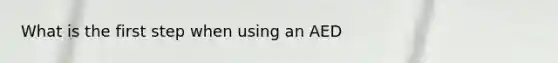 What is the first step when using an AED