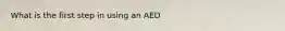 What is the first step in using an AED