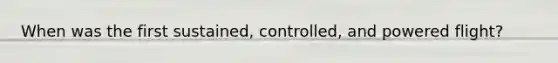 When was the first sustained, controlled, and powered flight?