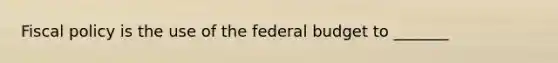 Fiscal policy is the use of the federal budget to​ _______