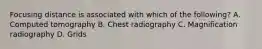Focusing distance is associated with which of the following? A. Computed tomography B. Chest radiography C. Magnification radiography D. Grids