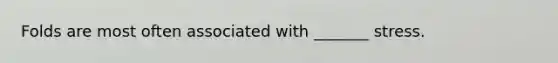 Folds are most often associated with _______ stress.