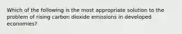 Which of the following is the most appropriate solution to the problem of rising carbon dioxide emissions in developed economies?