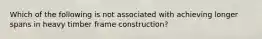 Which of the following is not associated with achieving longer spans in heavy timber frame construction?