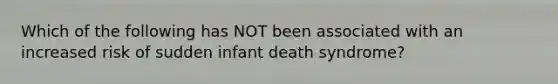 Which of the following has NOT been associated with an increased risk of sudden infant death syndrome?