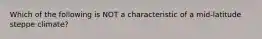 Which of the following is NOT a characteristic of a mid-latitude steppe climate?