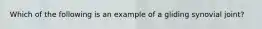 Which of the following is an example of a gliding synovial joint?