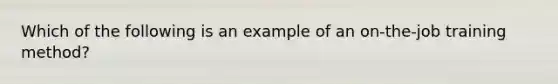 Which of the following is an example of an on-the-job training method?