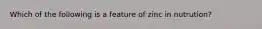 Which of the following is a feature of zinc in nutrution?