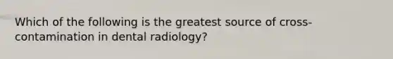 Which of the following is the greatest source of cross-contamination in dental radiology?