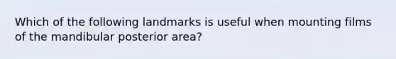 Which of the following landmarks is useful when mounting films of the mandibular posterior area?