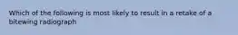 Which of the following is most likely to result in a retake of a bitewing radiograph