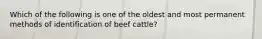 Which of the following is one of the oldest and most permanent methods of identification of beef cattle?