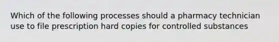 Which of the following processes should a pharmacy technician use to file prescription hard copies for controlled substances