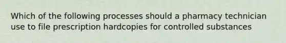 Which of the following processes should a pharmacy technician use to file prescription hardcopies for controlled substances