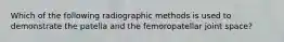 Which of the following radiographic methods is used to demonstrate the patella and the femoropatellar joint space?