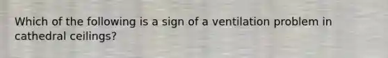 Which of the following is a sign of a ventilation problem in cathedral ceilings?