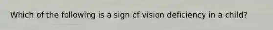 Which of the following is a sign of vision deficiency in a child?