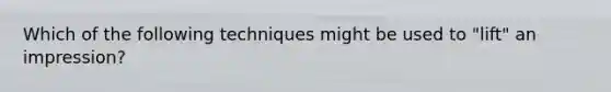 Which of the following techniques might be used to "lift" an impression?