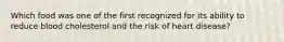 Which food was one of the first recognized for its ability to reduce blood cholesterol and the risk of heart disease?