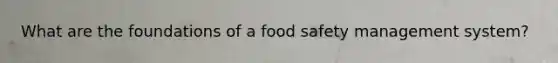 What are the foundations of a food safety management system?