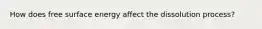 How does free surface energy affect the dissolution process?