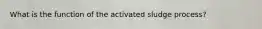 What is the function of the activated sludge process?