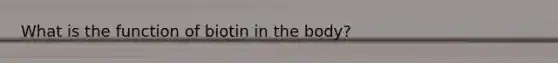 What is the function of biotin in the body?