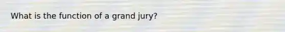 What is the function of a grand jury?