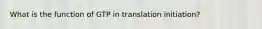 What is the function of GTP in translation initiation?