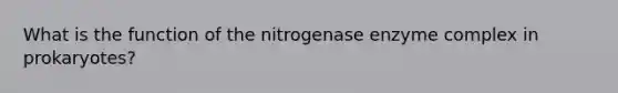 What is the function of the nitrogenase enzyme complex in prokaryotes?