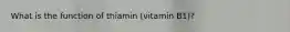 What is the function of thiamin (vitamin B1)?