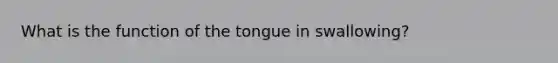 What is the function of the tongue in swallowing?