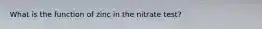 What is the function of zinc in the nitrate test?