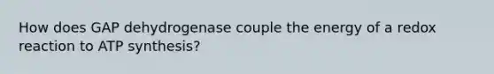 How does GAP dehydrogenase couple the energy of a redox reaction to ATP synthesis?
