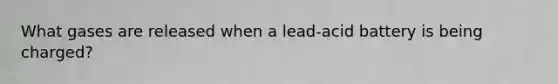 What gases are released when a lead-acid battery is being charged?