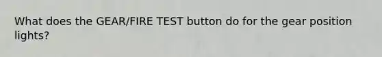 What does the GEAR/FIRE TEST button do for the gear position lights?