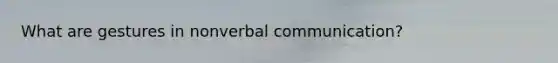 What are gestures in nonverbal communication?