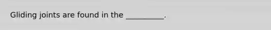 Gliding joints are found in the __________.