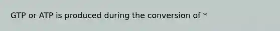 GTP or ATP is produced during the conversion of *