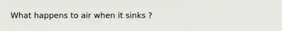 What happens to air when it sinks ?