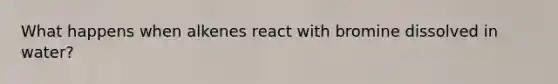 What happens when alkenes react with bromine dissolved in water?