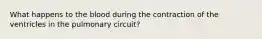 What happens to the blood during the contraction of the ventricles in the pulmonary circuit?