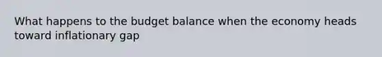 What happens to the budget balance when the economy heads toward inflationary gap