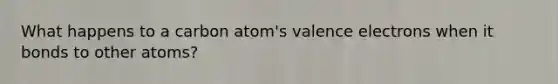 What happens to a carbon atom's valence electrons when it bonds to other atoms?