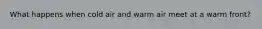 What happens when cold air and warm air meet at a warm front?