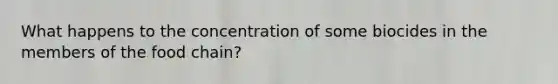 What happens to the concentration of some biocides in the members of the food chain?