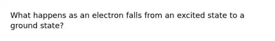 What happens as an electron falls from an excited state to a ground state?