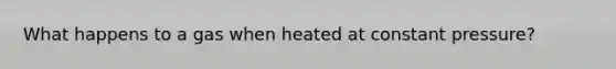 What happens to a gas when heated at constant pressure?